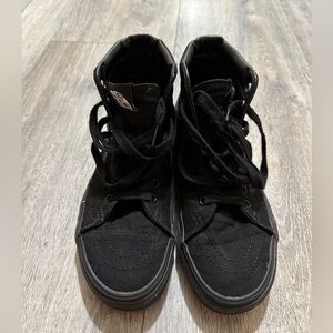 Black Van’s Hi-top Sneakers